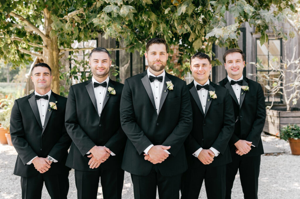 New Jersey groom with his groomsmen on his summer wedding day at Beach Plum Farm in Cape May