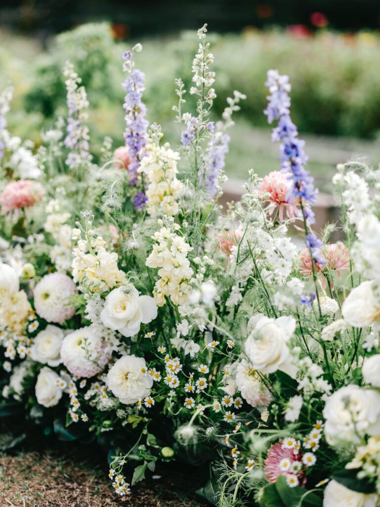 gorgeous summer wedding florals for outdoor wedding ceremony by Emily Wren Photography