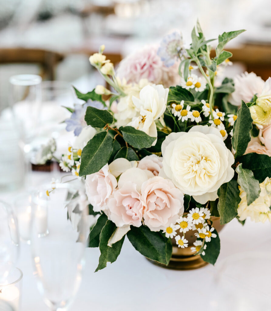 white and pink floral decor for summer wedding reception with daisies by Emily Wren Photography