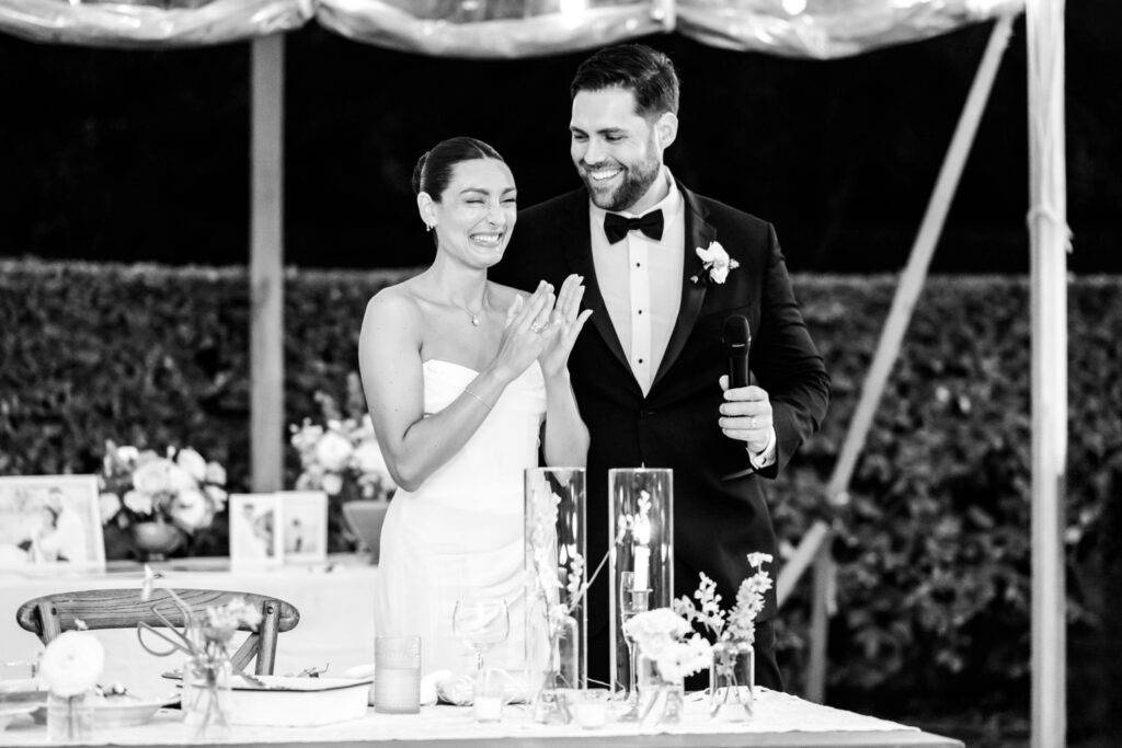 New Jersey bride and groom giving a speech at their outdoor summer wedding reception at Beach Plum Farm