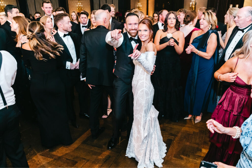 bride and groom having fun at their winter wedding reception in Center City Philadelphia