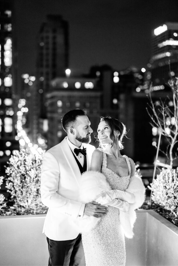 night portraits of Philadelphia bride and groom on the rooftop of the union league on Center City wedding day