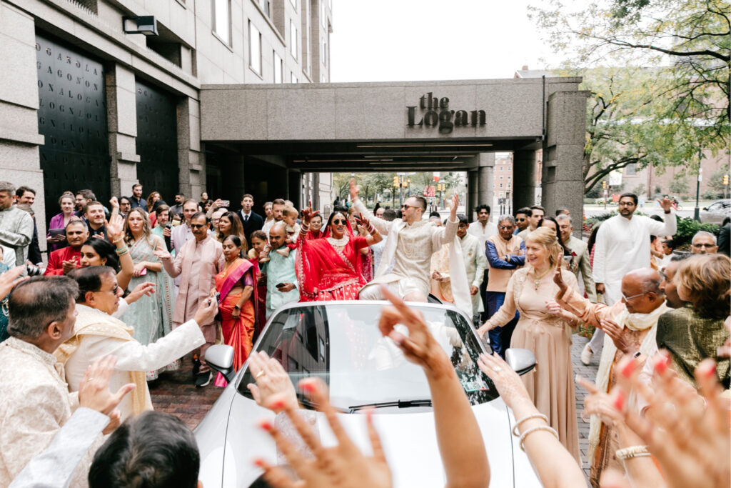 Philadelphia's bride and groom during their Baraat at The Logan hotel in Center City