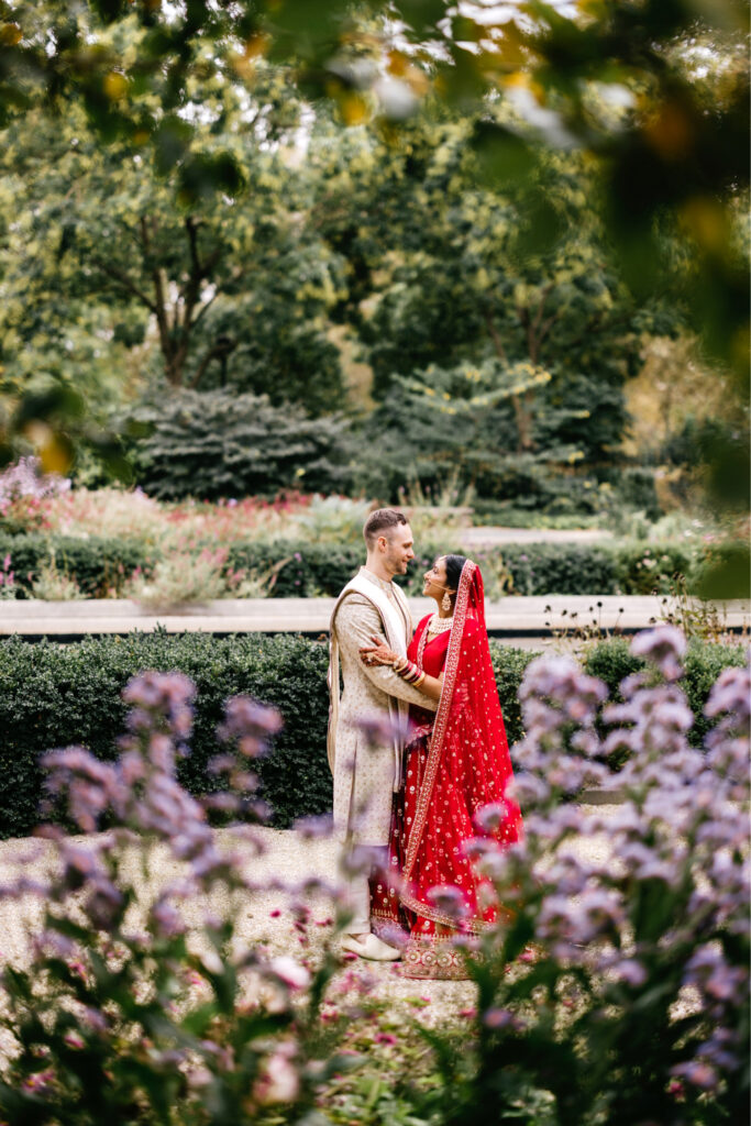 romantic bride and groom portrait at the Rodin Museum's gardens in Center City Philadelphia by Emily Wren Photography