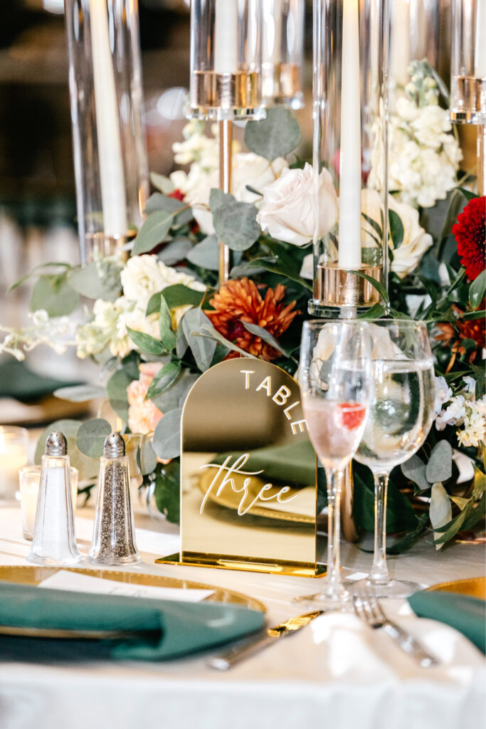 gold mirror table numbers for luxurious wedding reception in Center City Philadelphia at Water Works