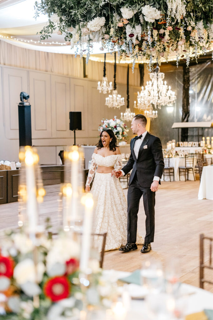 bride and groom's first reaction to their wedding reception details at Cescaphe's Water Works