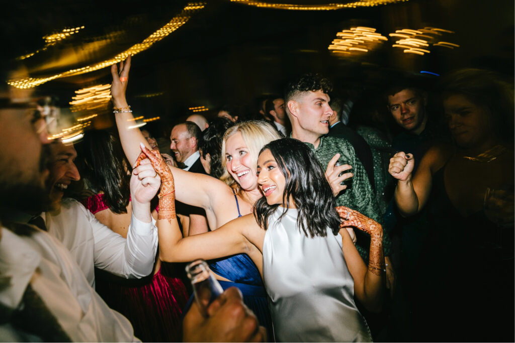 Philadelphia bride having fun during her Cescaphe wedding reception