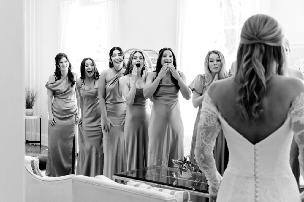 bride's first look with her bridesmaids at her summer Philadelphia wedding
