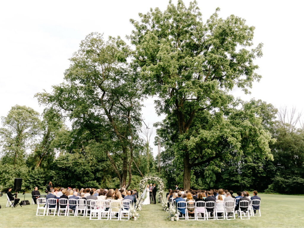 Elegant outdoor spring wedding ceremony at the Inn at Barley Sheaf by luxury wedding photographer Emily Wren Photography