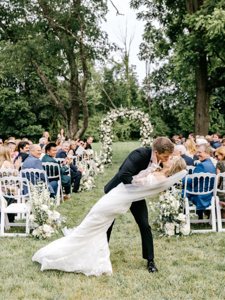 Philadelphia bride and groom exiting their outdoor spring wedding ceremony at the Inn at Barley Sheaf