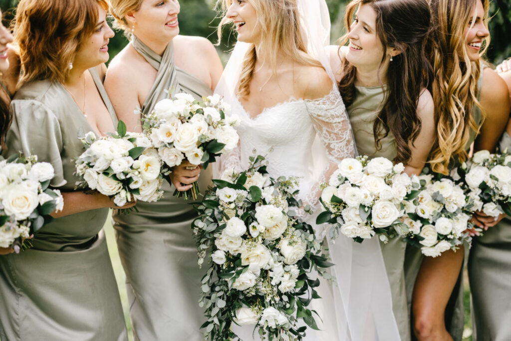 all white floral spring wedding bouquets by Emily Wren Photography