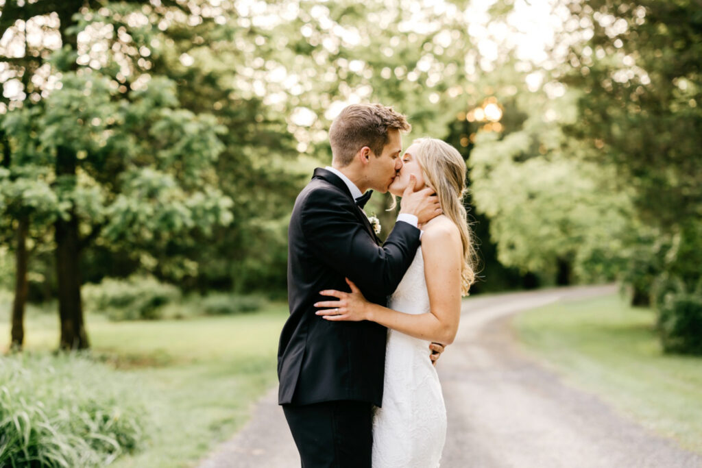 Romantic early summer wedding portraits of bride and groom during golden hour by Emily Wren Photography