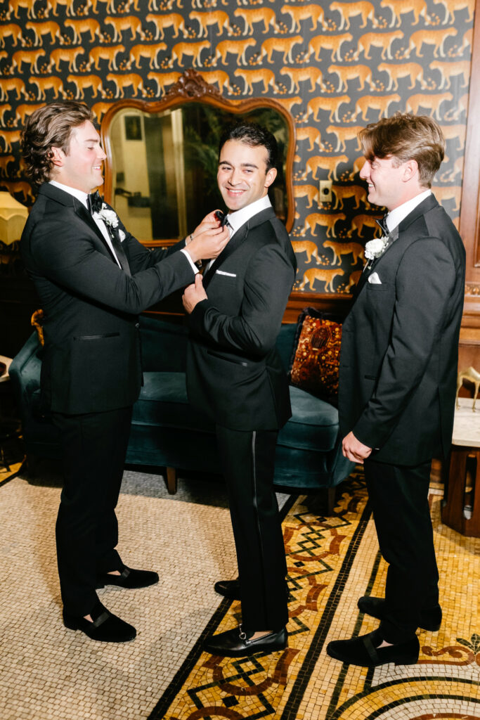 Delaware groom getting ready for his fall wedding day at Hotel Du Pont