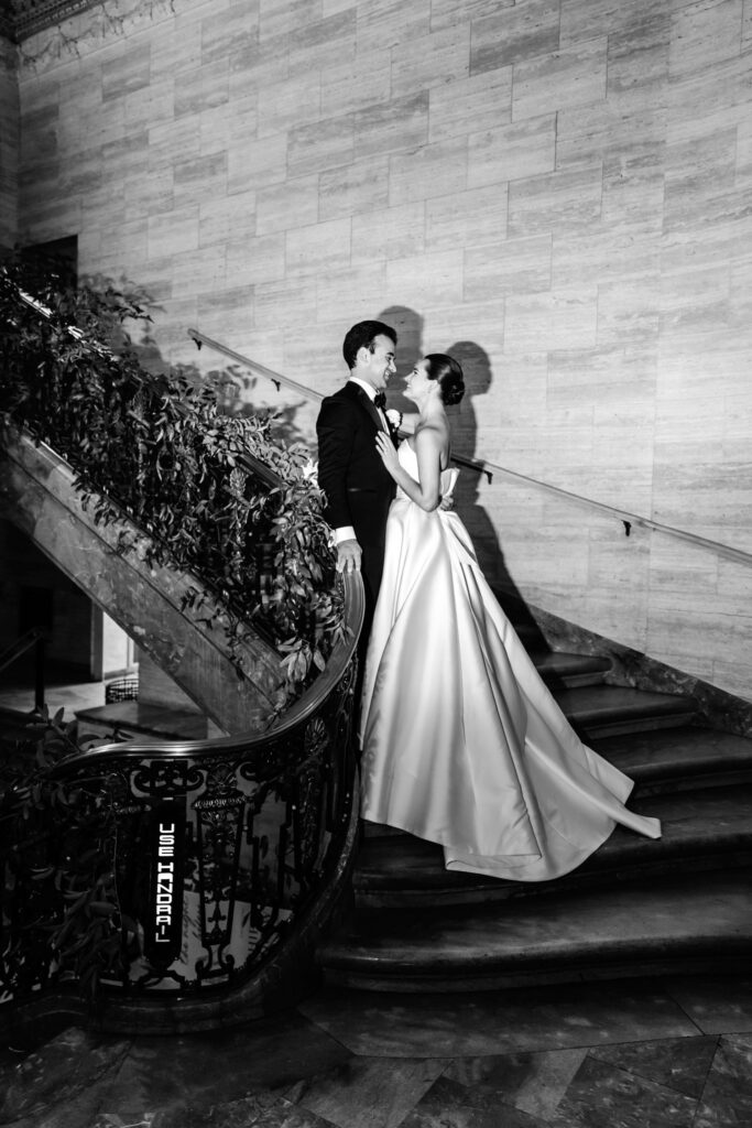 romantic and glamorous wedding day portraits of bride and groom in luxury Delaware hotel