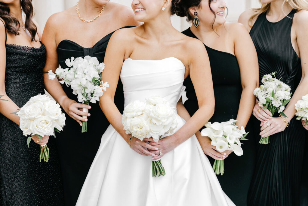 all white bridesmaid bouquets for black-tie wedding by Emily Wren Photography