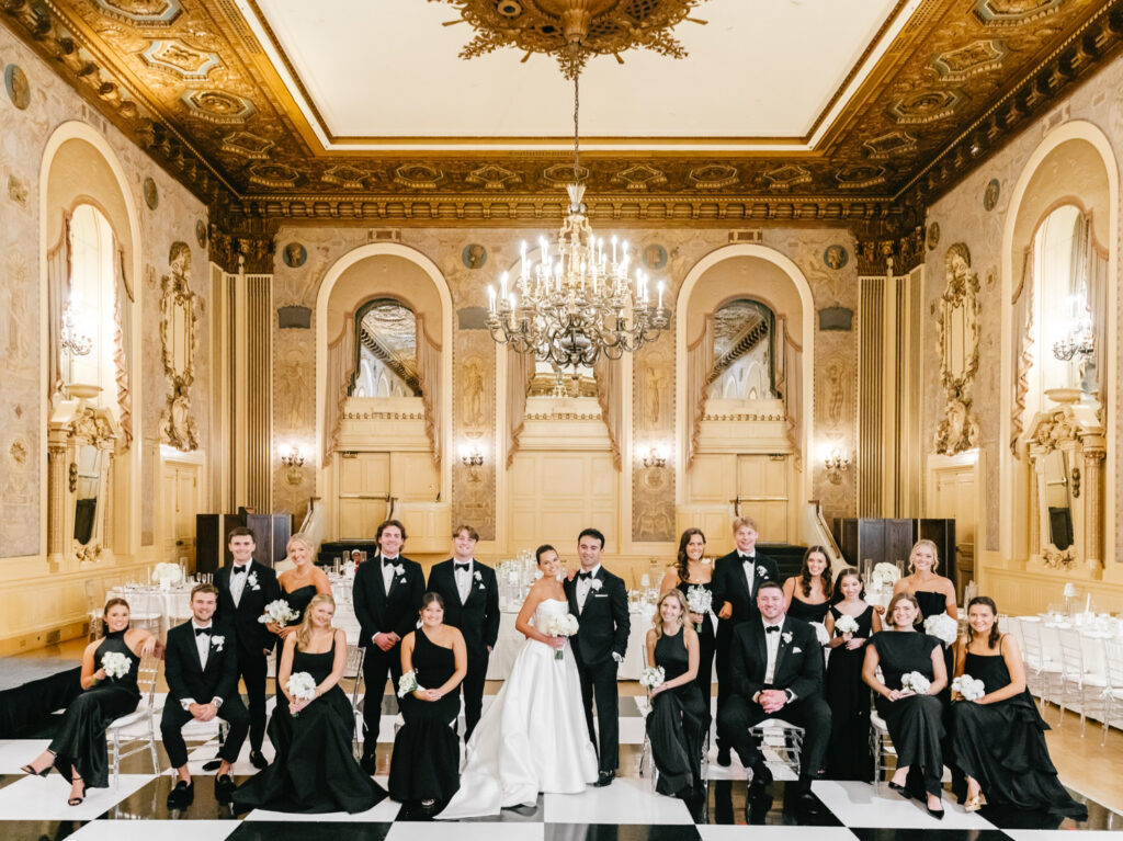 Glamorous full wedding party portrait at Hotel Du Pont by Delaware wedding photographer Emily Wren Photography