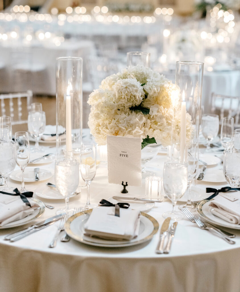 all white floral bouquets for table centerpiece of luxurious Hotel Du Pont wedding reception