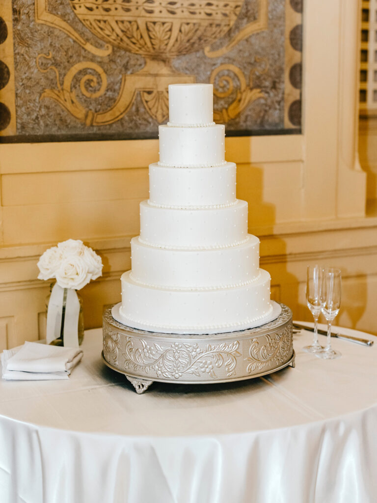 simplistic six-tier wedding cake by Emily Wren Photography