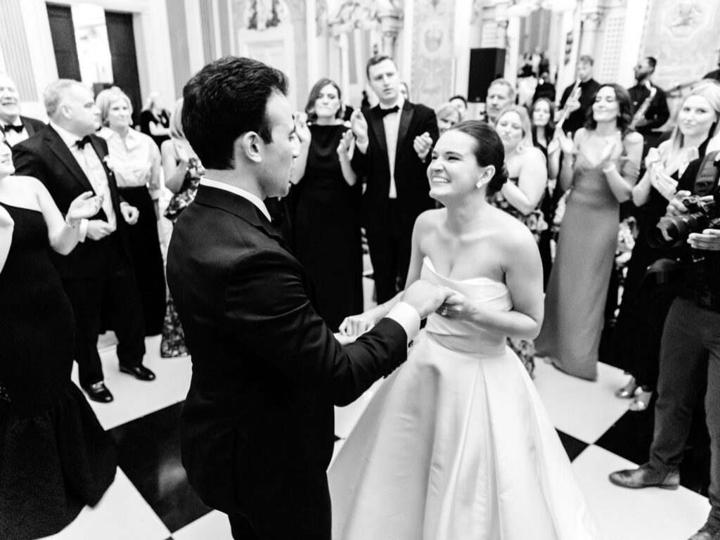 bride and groom dancing and having fun at their luxurious Delaware wedding reception by Emily Wren Photography