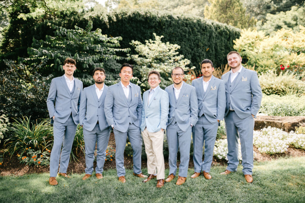 New England groom with his groomsmen on his outdoor summer wedding day