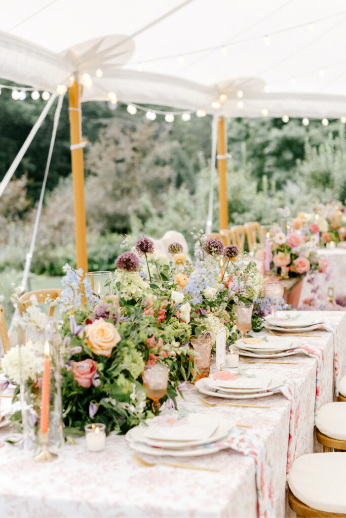 beautiful summer garden-inspired wedding reception table decor at Uncanoonuc Mountain