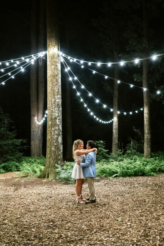 romantic outdoor night portrait of New Hampshire bride and groom on their summer wedding day