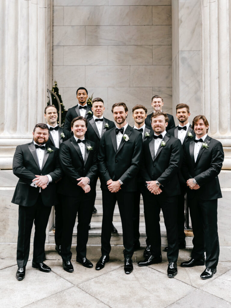 Philadelphia groom with his groomsmen on his winter wedding day by Emily Wren Photography