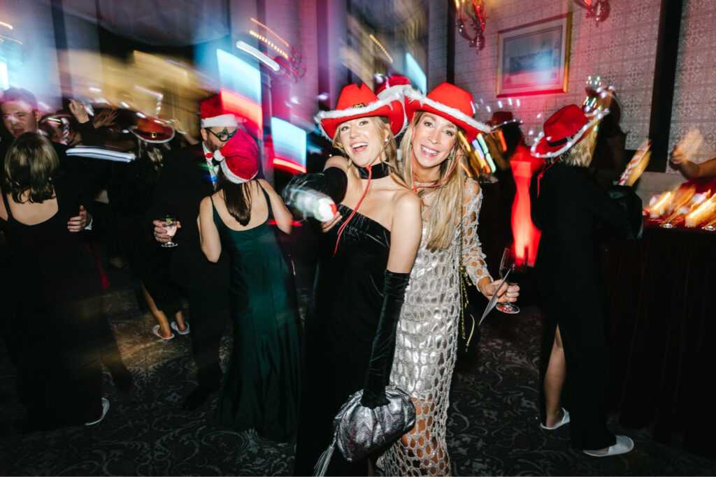 Philadelphia wedding guests having fun at a Christmas wedding reception after-party