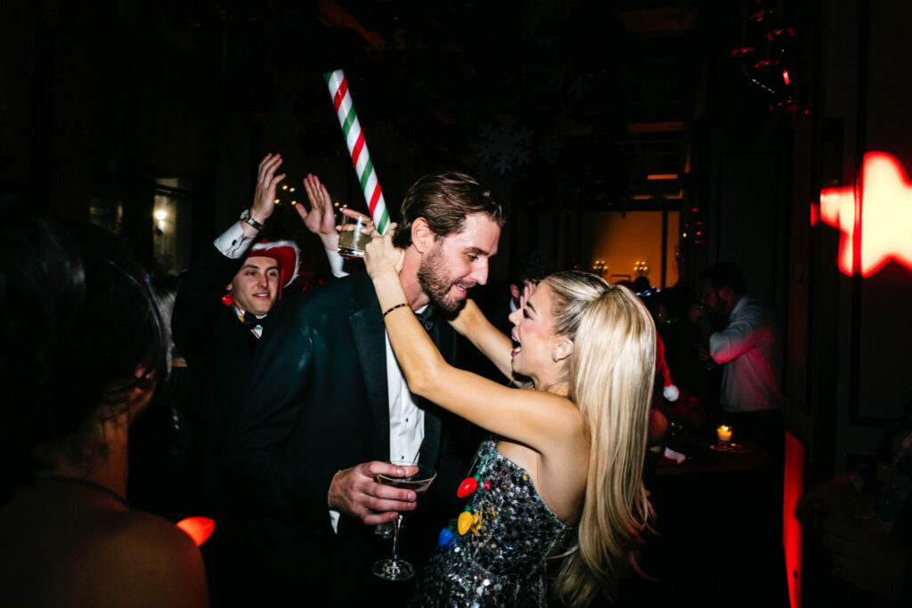 Philadelphia bride and groom at their Christmas-inspired winter wedding reception after-party at The Ritz-Carlton by Emily Wren Photography