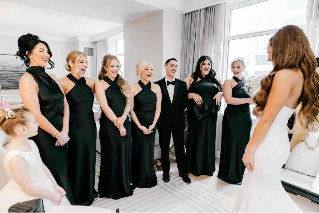 bride's first look with her bridesmaids and flower girl by Philadelphia wedding photographer Emily Wren Photography