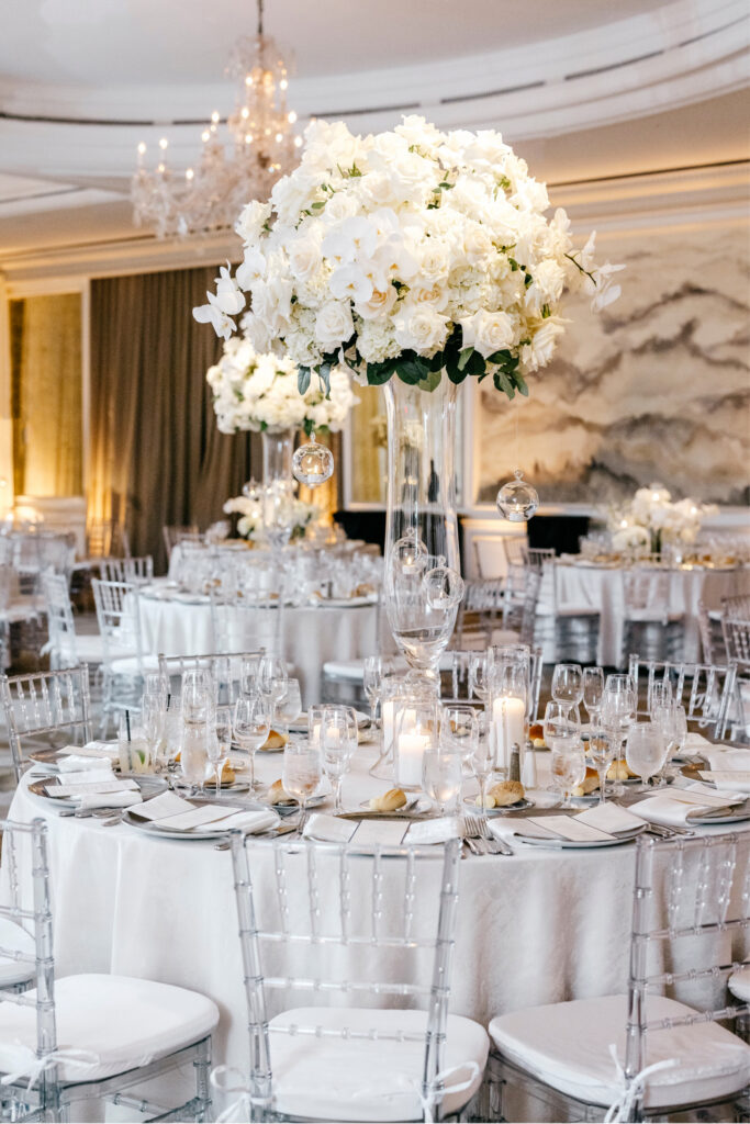 luxurious all white floral table centerpiece at Center City Philadelphia wedding reception at The Westin