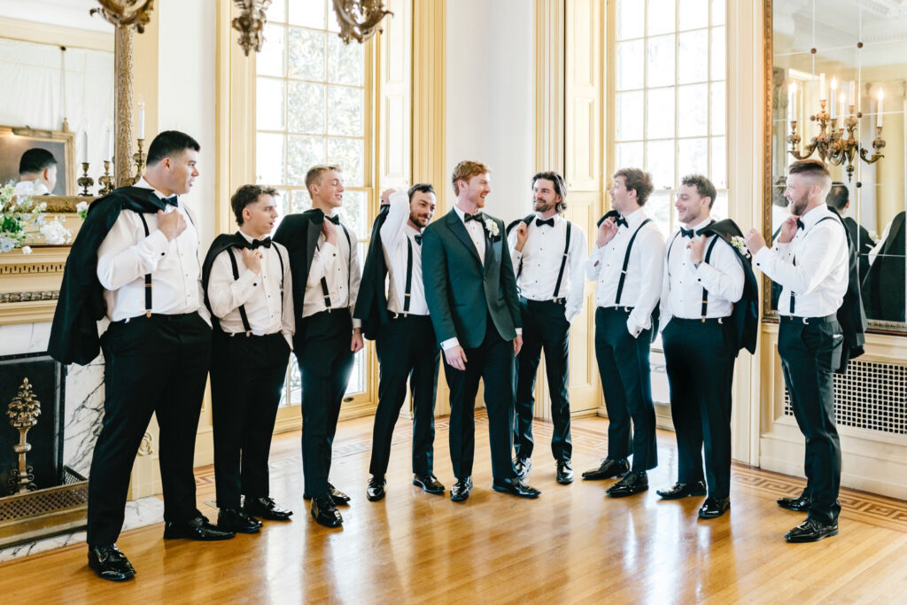 Philadelphia groom with his groomsmen at Glen Foerd on his spring wedding day