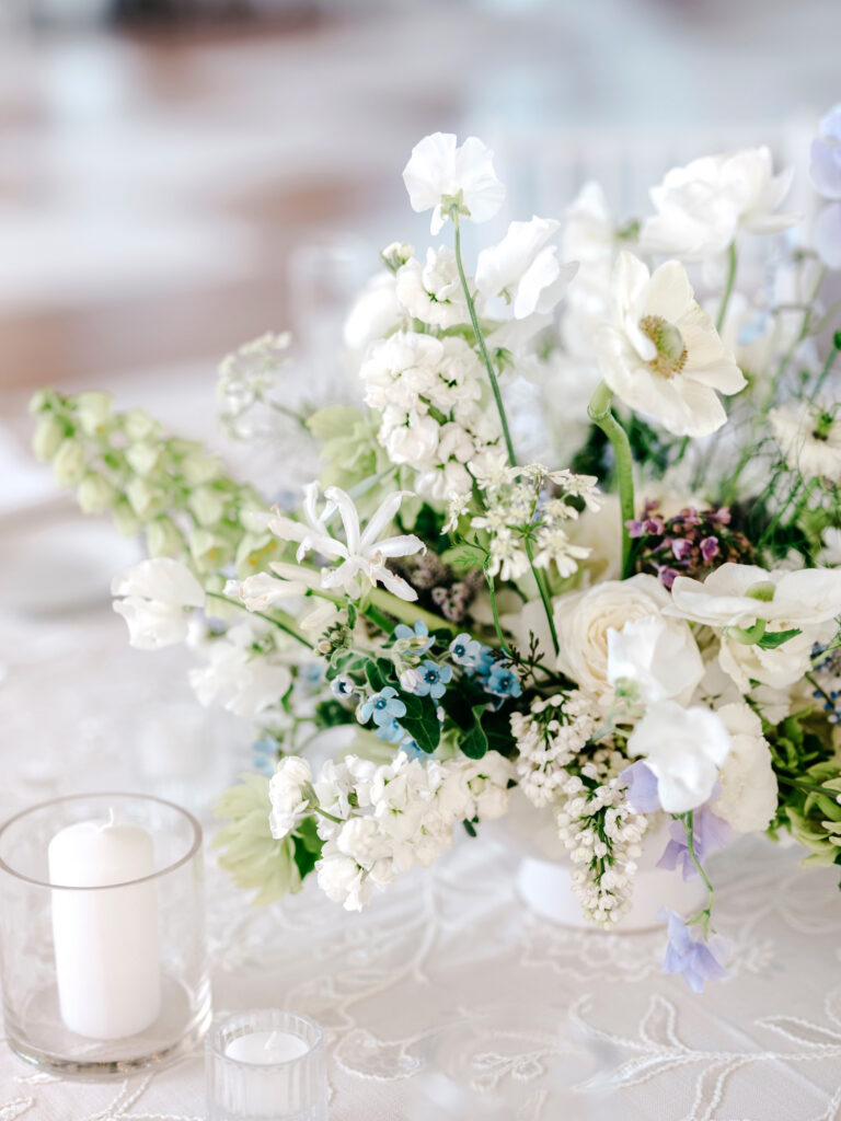 spring floral centerpieces at Philadelphia wedding reception by Emily Wren Photography