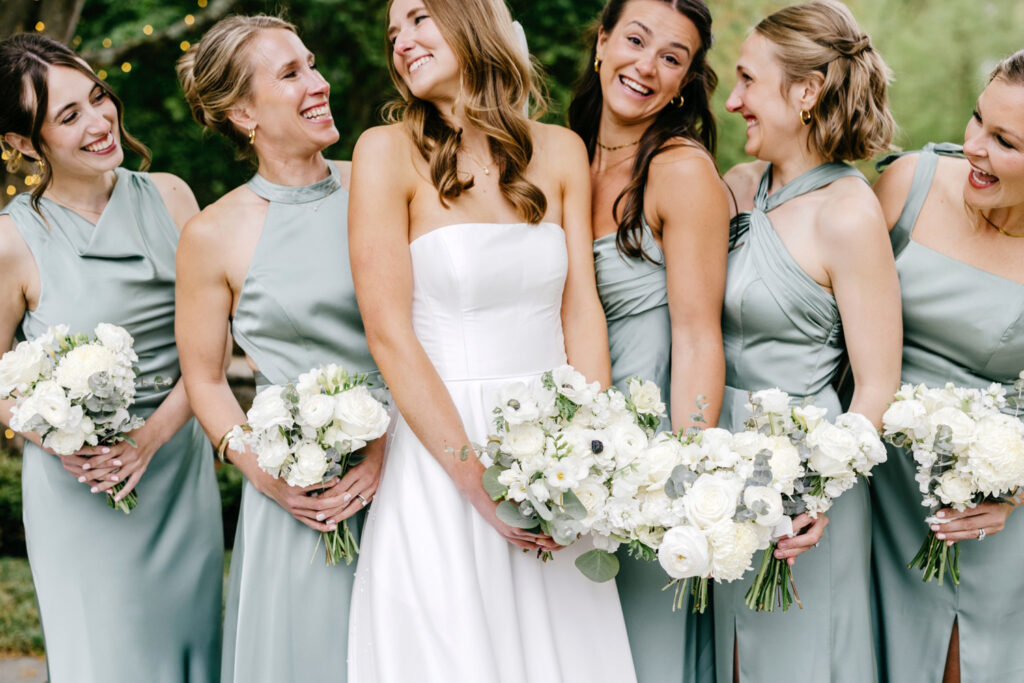 Philadelphia bride with her bridesmaids on spring wedding day on the Main Line