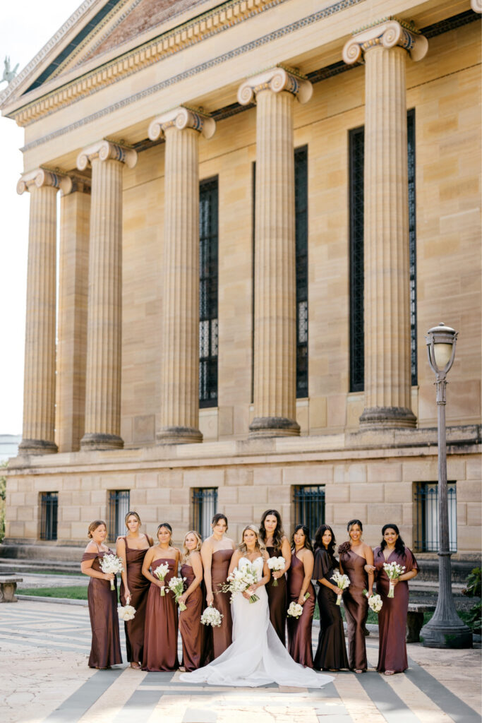 Philadelphia bride with her bridesmaids on early fall wedding day at the Philadelphia Art Museum