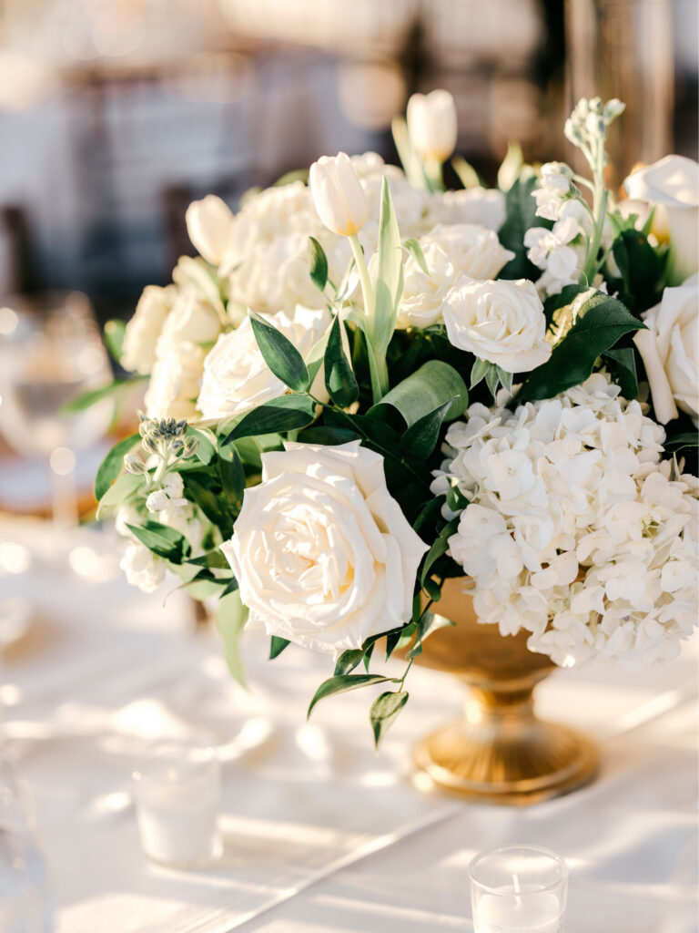 all white floral bouquets for wedding reception tables at Water Works