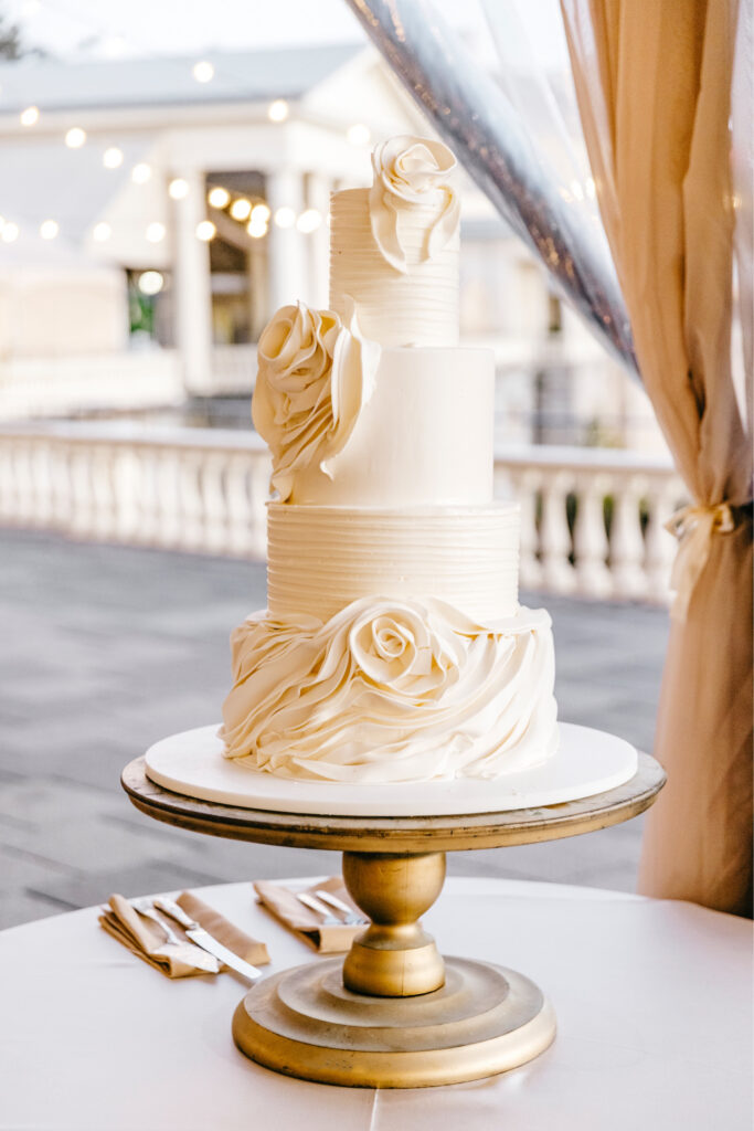 four tier extravagant wedding cake by Emily Wren Photography