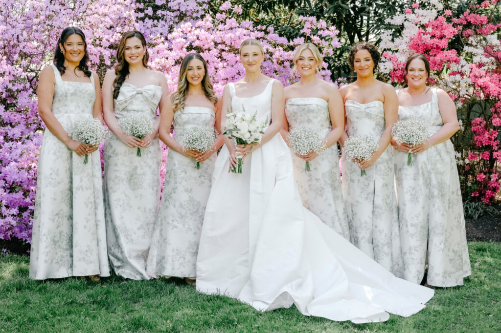 Philadelphia bride with her bridesmaids on her colorful spring wedding day in Center City