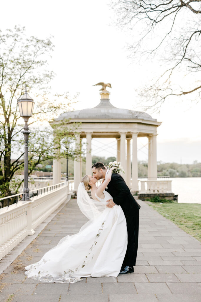 elegant wedding portraits of Philadelphia bride and groom in front of the gazebo at Water Works during their Cescaphe wedding day