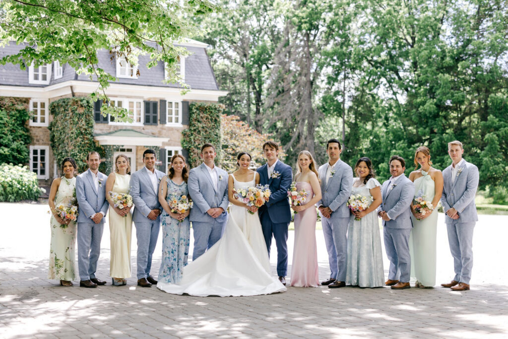 full wedding party on summer wedding day at the Inn at Barley Sheaf by Emily Wren Photography