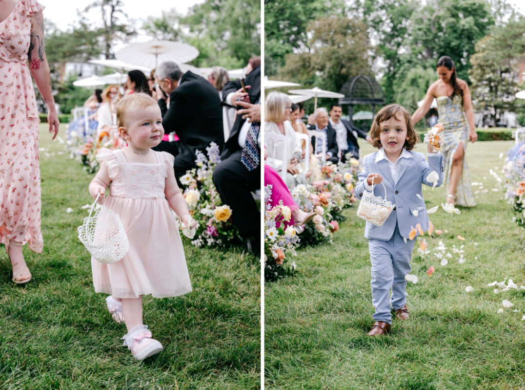 cute flower girl and ring bearer walking down the aisle at outdoor wedding ceremony in Pennsylvania