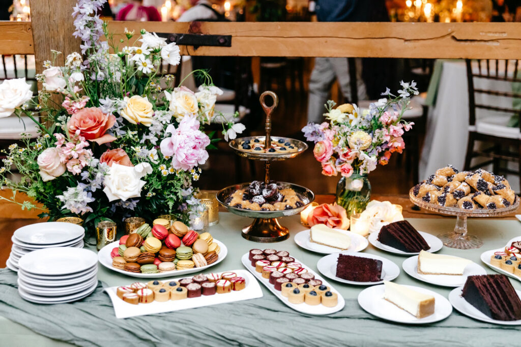 beautiful and colorful dessert table at elegant Philadelphia wedding reception by Emily Wren Photography