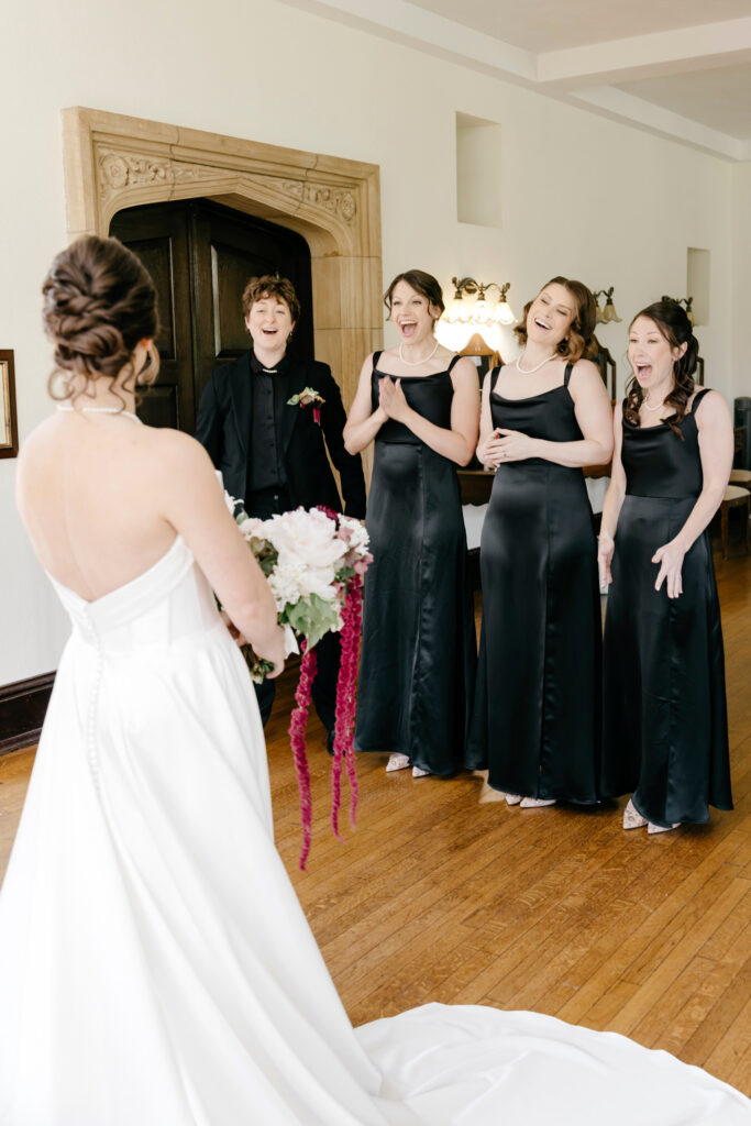 bride's first look with her bridesmaids on her spring wedding day in Philadelphia, Pennsylvania