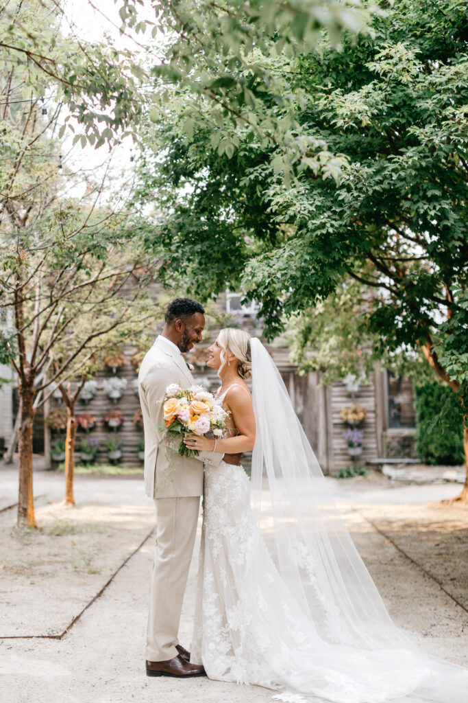 Philadelphia bride and groom wedding portraits on their whimsical garden summer wedding day at Terrain at Styer's